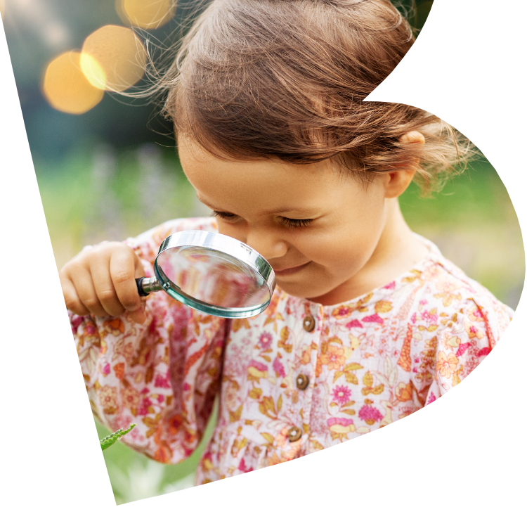 A child exploring nature outdoors